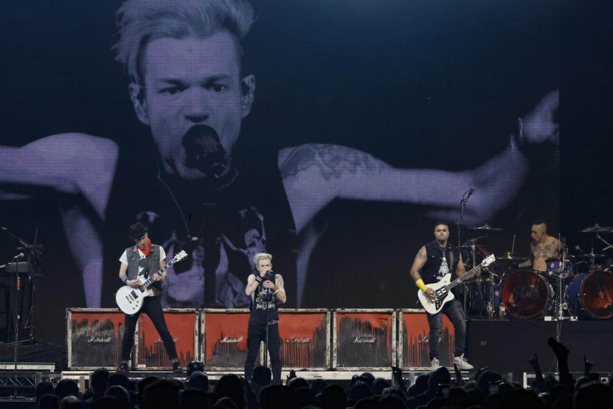 Tom Thacker, Deryck Whibley, Dave Baksh and Frank Zummo of Sum 41 perform onstage at the 2024 iHeartRadio ALTer EGO Presented by Capital One at the Honda Center, January 13, 2024 in Anaheim, California. (Credit: Kevin Winter/Getty Images for iHeartRadio)