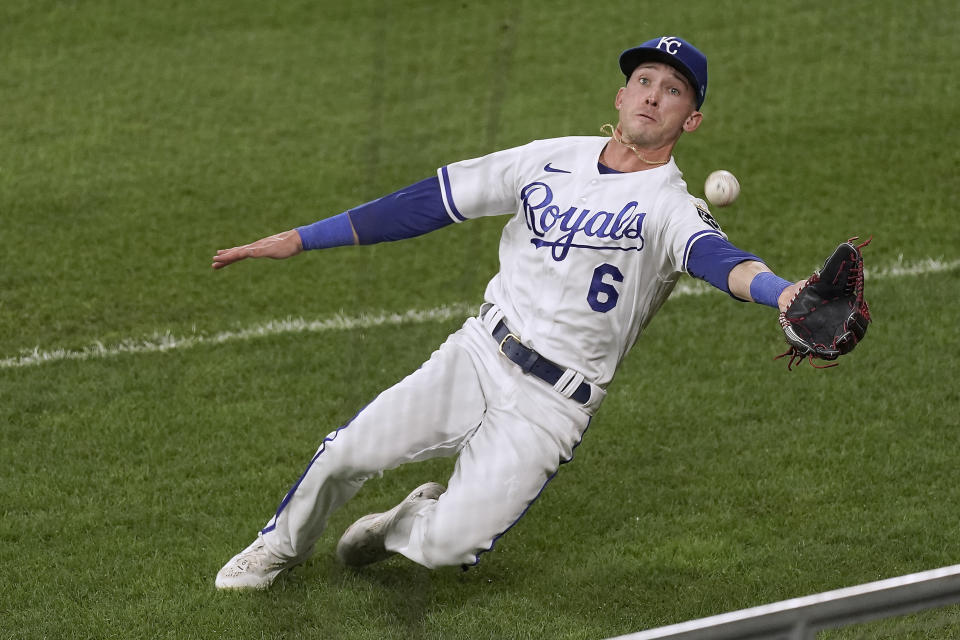 Kansas City Royals right fielder Drew Waters misses a fly foul ball hit by Cleveland Guardians' Myles Straw during the seventh inning of a baseball game Tuesday, Sept. 6, 2022, in Kansas City, Mo. (AP Photo/Charlie Riedel)