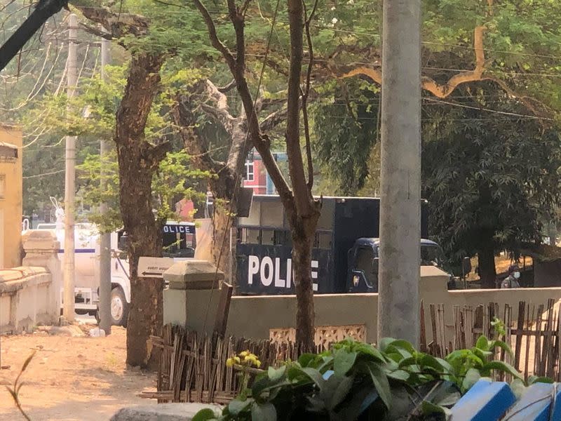 A police vehicle is seen as shots were fired at protesters in Nyaung-U