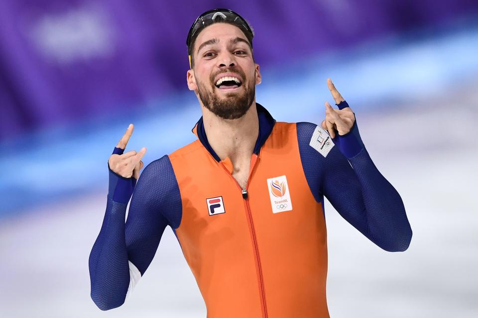 <p>Netherlands’ Kjeld Nuis celebrates after winning the Men’s 1,000m Speed Skating event during the PyeongChang 2018 Winter Olympic Games, February 23, 2018.<br> (Photo by Aris Messinis/AFP/Getty Images) </p>