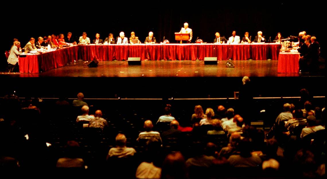 Panel members reviewing the Florida Constitution in Panama City, Fla.