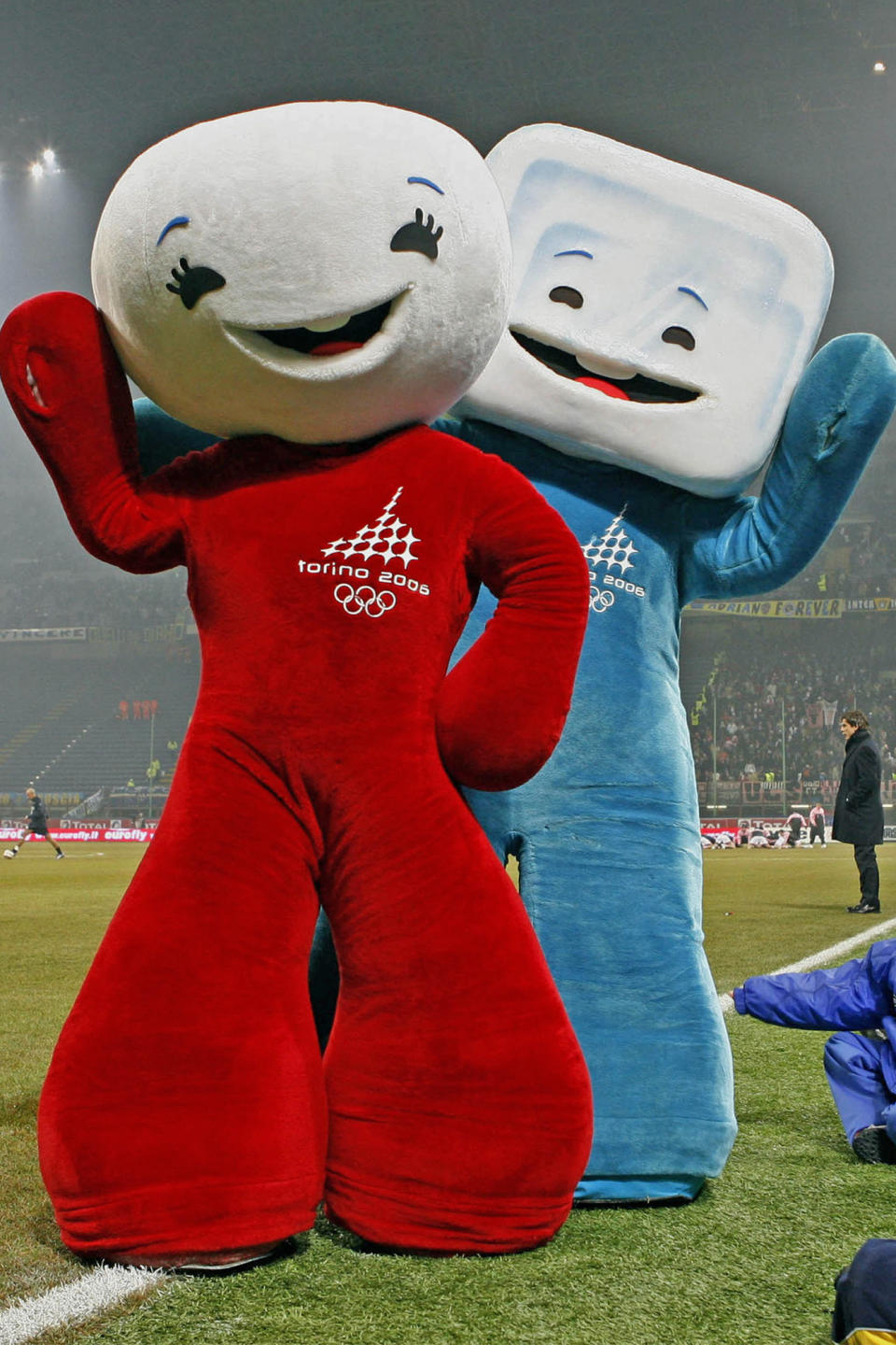 <p>Neve and Gliz, a snowball and ice cube, respectively, by Pedro Albuquerque, were made to represent the elements required for the games. Per <a href="https://olympics.com/en/olympic-games/turin-2006/mascot" rel="nofollow noopener" target="_blank" data-ylk="slk:Olympics.com;elm:context_link;itc:0;sec:content-canvas" class="link ">Olympics.com</a>, Neve was "linked to harmony and elegance of movement" with her rounded form, while Gliz's angular shape recalled "the power and strength of athletes." </p>