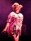 <p>Billie Eilish cracks a smile on Sept. 19 while performing at the Life Is Beautiful festival in Las Vegas. </p>