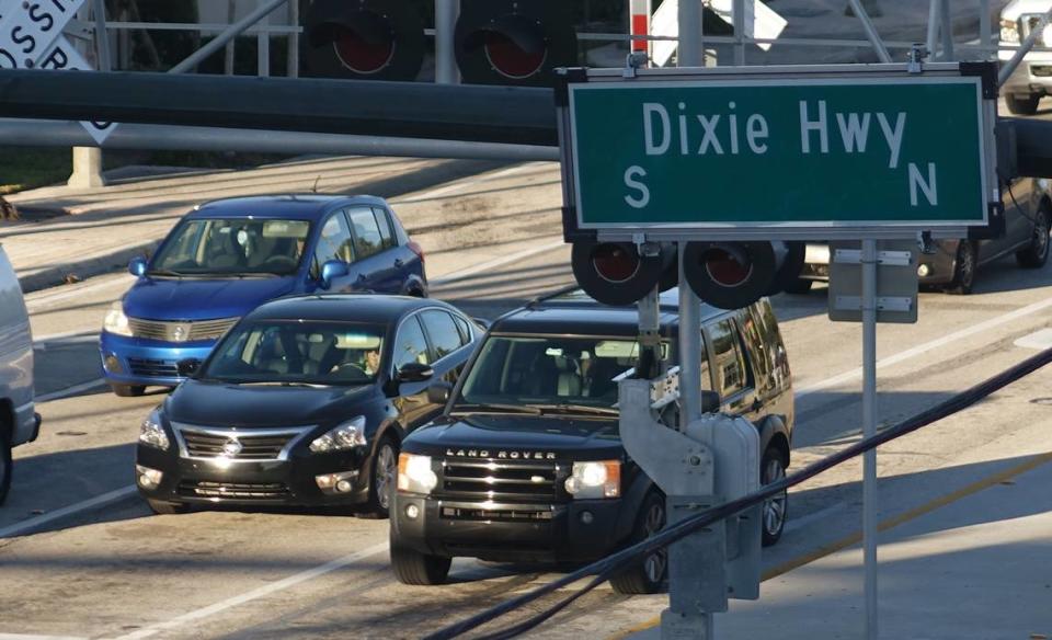 Traffic stops on Camino Real at Dixie Highway in Boca Raton.