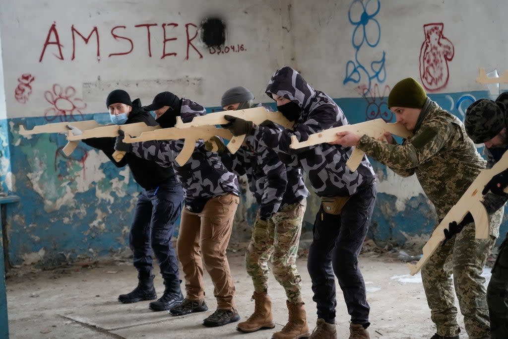 Local residents attend an all-Ukrainian training day close to Kyiv (Efrem Lukatsky/AP) (AP)