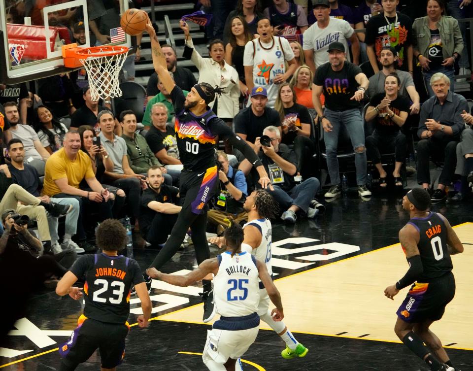 May 2, 2022; Phoenix, Arizona, USA; Phoenix Suns center JaVale McGee (00) slams two against the Dallas Mavericks during game one of the NBA Western Conference semifinals at Footprint Center.