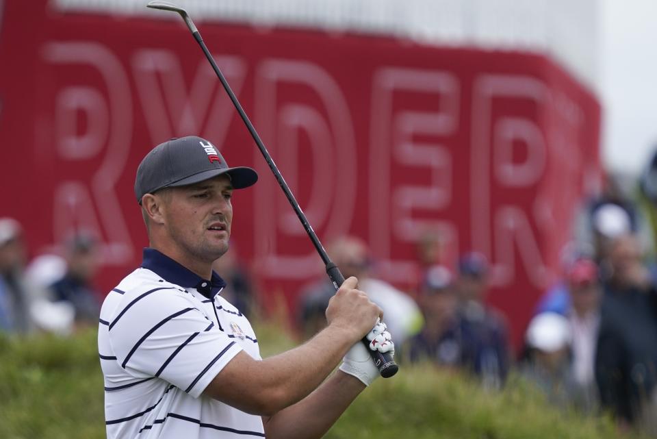Team USA's Bryson DeChambeau hits a shot on the first hole during a practice day at the Ryder Cup at the Whistling Straits Golf Course Tuesday, Sept. 21, 2021, in Sheboygan, Wis. (AP Photo/Charlie Neibergall)