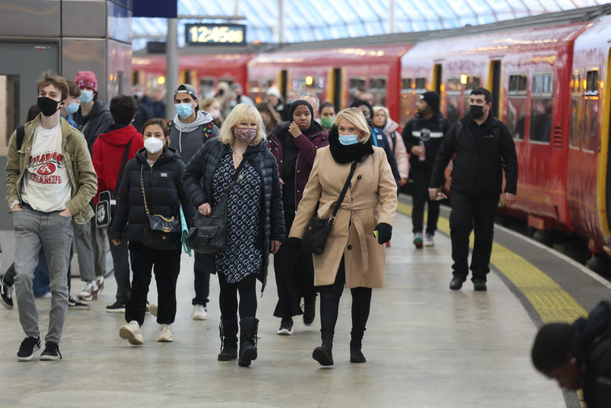 Passengers at Waterloo Station in Central London. Prime Minister Boris Johnson has said that the vaccination campaign had allowed England to maintain its current level of coronavirus controls. Picture date: Wednesday December 29, 2021.