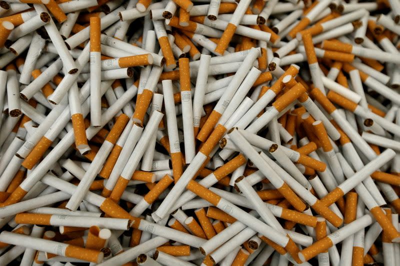 FILE PHOTO: Lucky Strike cigarettes are seen during manufacturing process in BAT Cigarette Factory in Bayreuth