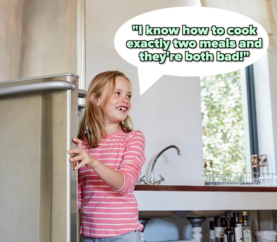 A little girl raiding the fridge
