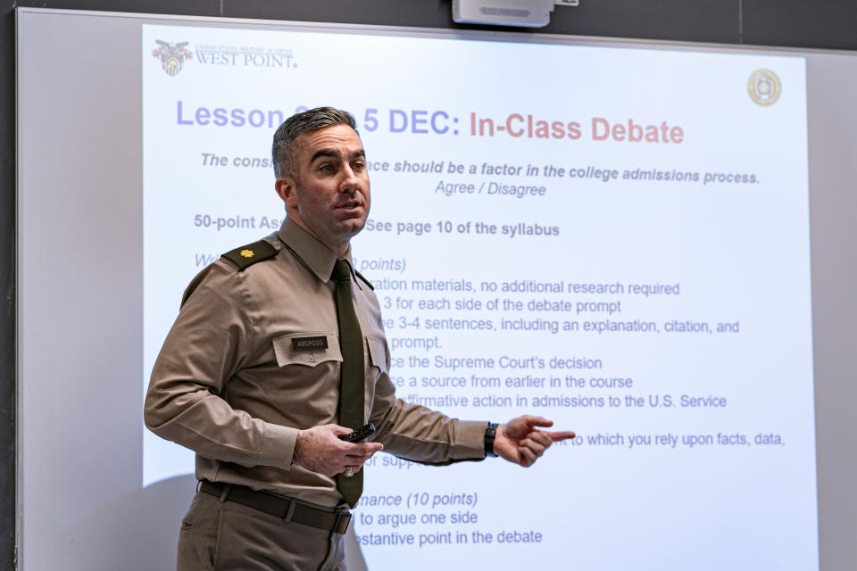 Maj. Joe Amoroso instructs cadets during a class on American politics at the United States Military Academy in West Point, N.Y., Wednesday, Nov. 29, 2023. (AP Photo/Peter K. Afriyie)