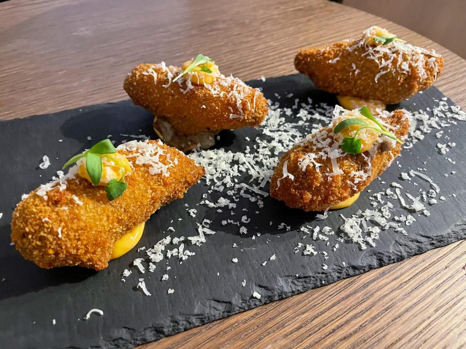 A plate of pāua croquettes.