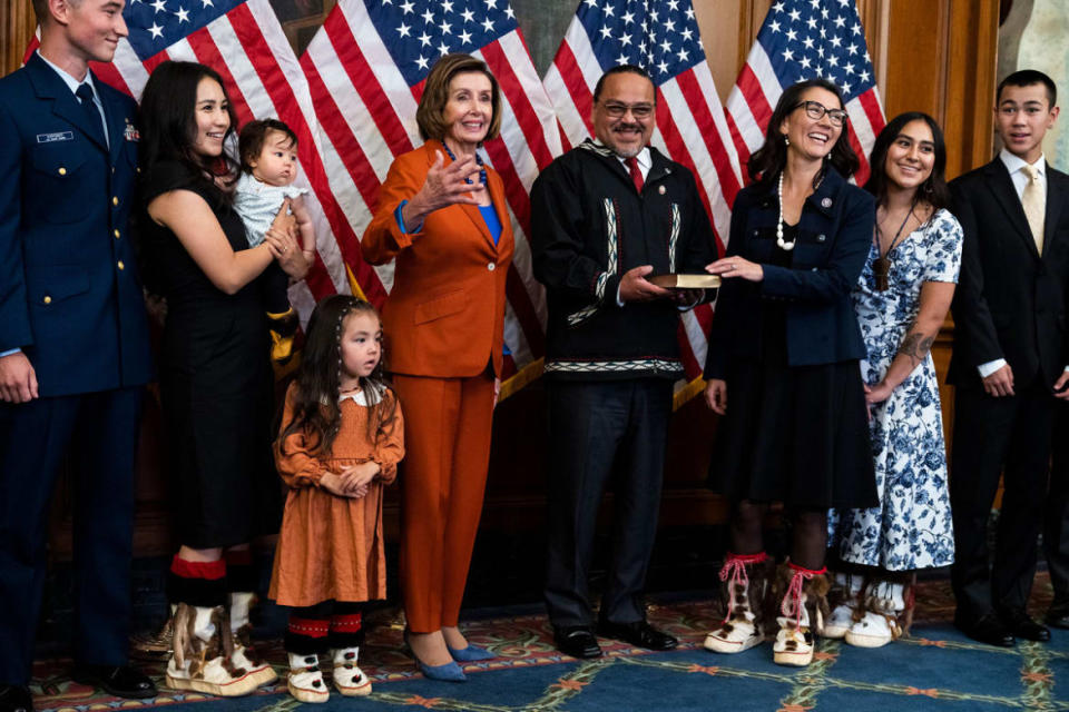 <div class="inline-image__title">1243210071</div> <div class="inline-image__caption"><p>Rep. Mary Peltola, D-Alaska, third from right, along with her family, participates in a swearing-in ceremony with Speaker of the House Nancy Pelosi, D-Calif., in the U.S. Capitol on Sept. 13, 2022. </p></div> <div class="inline-image__credit">Tom Williams/CQ-Roll Call, Inc via Getty Images</div>