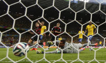 Germany's Toni Kroos (18) scores a goal during their 2014 World Cup semi-finals against Brazil at the Mineirao stadium in Belo Horizonte July 8, 2014. REUTERS/Eddie Keogh