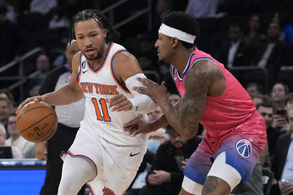 New York Knicks guard Jalen Brunson (11) drives against Washington Wizards guard Bradley Beal during the first half of an NBA basketball game Wednesday, Jan. 18, 2023, at Madison Square Garden in New York. (AP Photo/Mary Altaffer)
