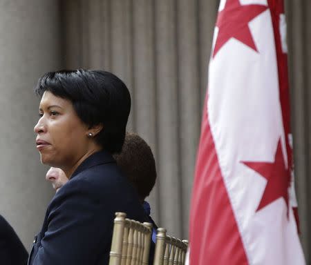 Washington D.C. Council member Muriel Bowser attends the ground breaking ceremony of the Trump International Hotel at the Old Post Office Building in Washington, in this July 23, 2014 file photo. REUTERS/Gary Cameron/Files