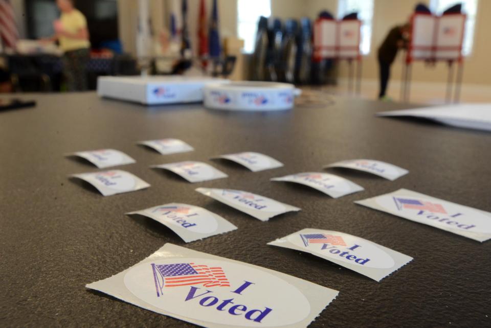 Voters cast their ballots for two contested races in Dennis Tuesday, May 14. The booths at the Dennis Senior Center for Precinct 2 voting are seen in this file photo.