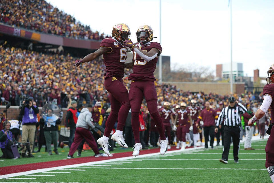 MINNEAPOLIS, MN - NOVEMBER 09: Rashod Bateman #13 of the Minnesota Golden Gophers celebrates his touchdown with Tyler Johnson #6 of the against the Penn State Nittany Lions in the first quarter at TCFBank Stadium on November 9, 2019 in Minneapolis, Minnesota. (Photo by Adam Bettcher/Getty Images)