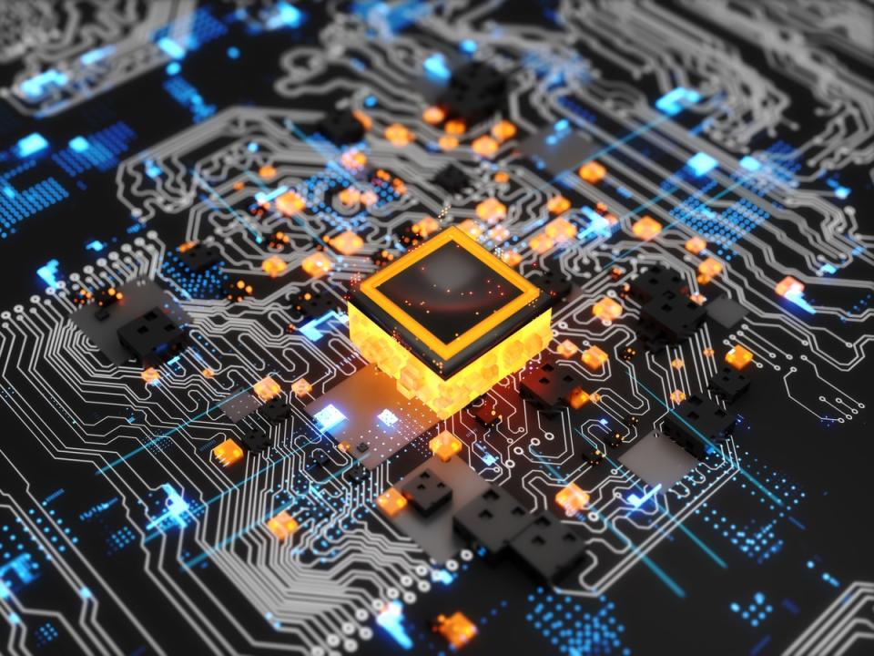 Rendering of an orange 3D chip on a blue, black, and gray circuit board. 