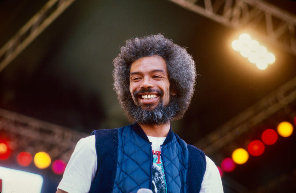 Cruised straight back to the airport with a newspaper tucked in his back pocket: Gil Scott-Heron at the Artists Against Apartheid Freedom Festival in 1986. (Credit: Steve Rapport via Getty Images)