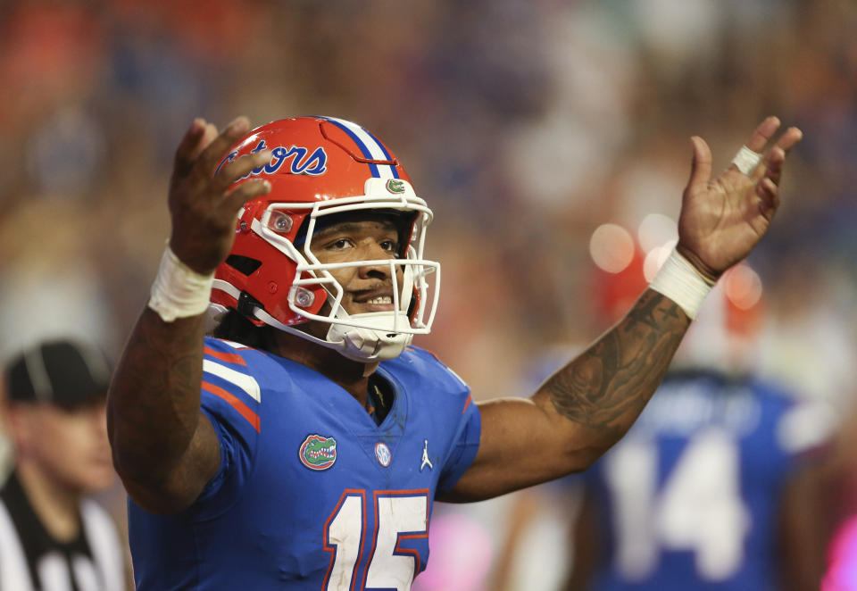 Florida quarterback Anthony Richardson (15) celebrates after a touchdown against South Carolina during the second half of an NCAA college football game, Saturday, Nov. 12, 2022, in Gainesville, Fla. (AP Photo/Matt Stamey)