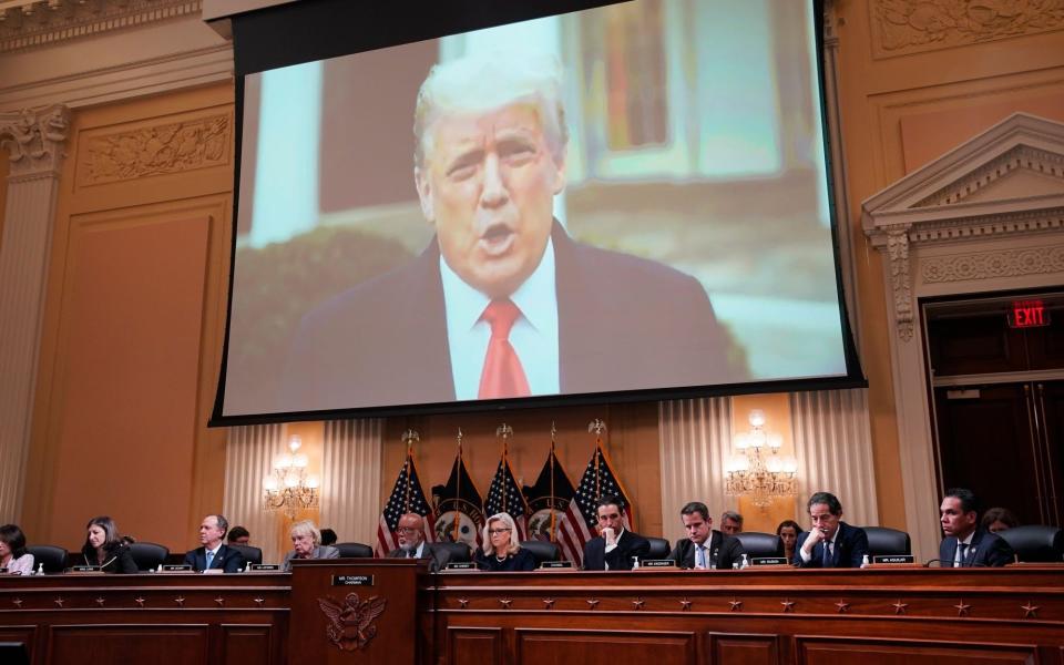 A video of former US President Donald Trump displayed on a screen during a hearing of the Select Committee to Investigate the January 6th Attack on the US Capitol in Washington, D.C., US, on Tuesday, June 28, 2022. Cassidy Hutchinson, who previously gave videotaped depositions offering insider details on the final days of Donald Trump's presidency, is appearing before the committee on short notice while most of Congress is on a two-week break. Photographer: Al Drago/Bloomberg - Al Drago/Bloomberg