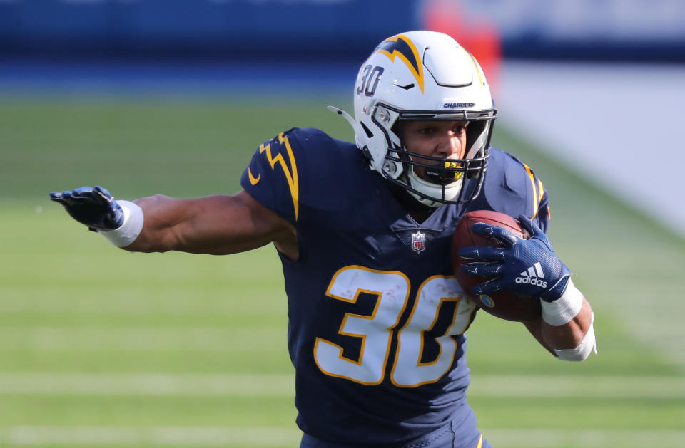 ORCHARD PARK, NY - NOVEMBER 29: Austin Ekeler #30 of the Los Angeles Chargers runs the ball during a game against the Buffalo Bills at Bills Stadium on November 29, 2020 in Orchard Park, New York. (Photo by Timothy T Ludwig/Getty Images)