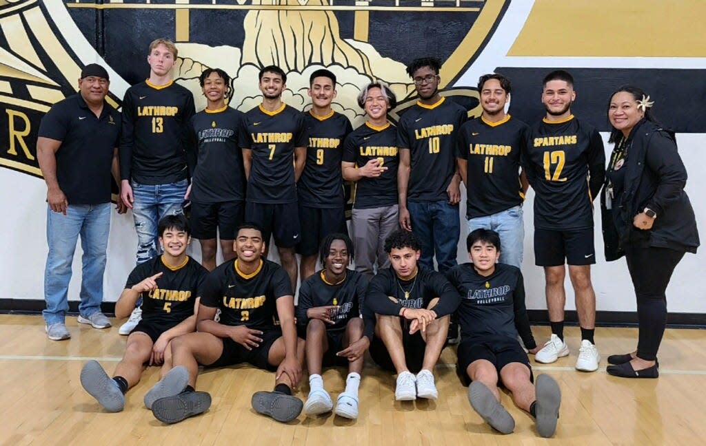 Lathrop High's boys volleyball team poses for a photo after it's Section playoff win against East Union on Tuesday in Lathrop.