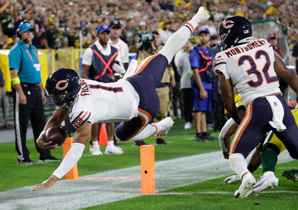 Chicago Bears quarterback Justin Fields (1) dives into the endzone for touchdown against the Green Bay Packers in the first quarter during their football game Sunday, September 18, 2022, at Lambeau Field in Green Bay, Wis. Dan Powers/USA TODAY NETWORK-Wisconsin