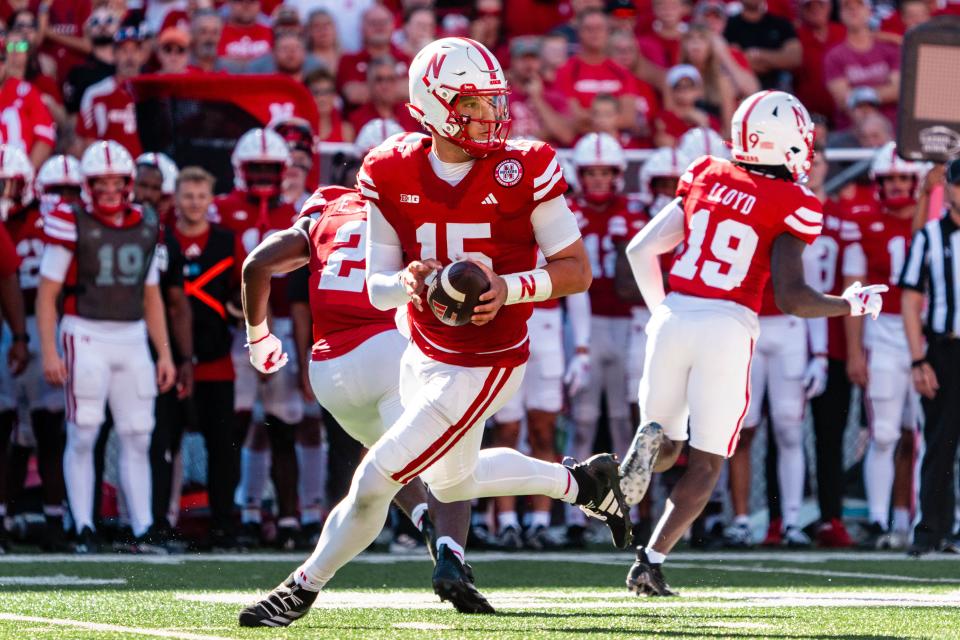 Nebraska quarterback Dylan Raiola rolls out to pass against UTEP during the third quarter on Aug. 31 at Memorial Stadium in Lincoln.