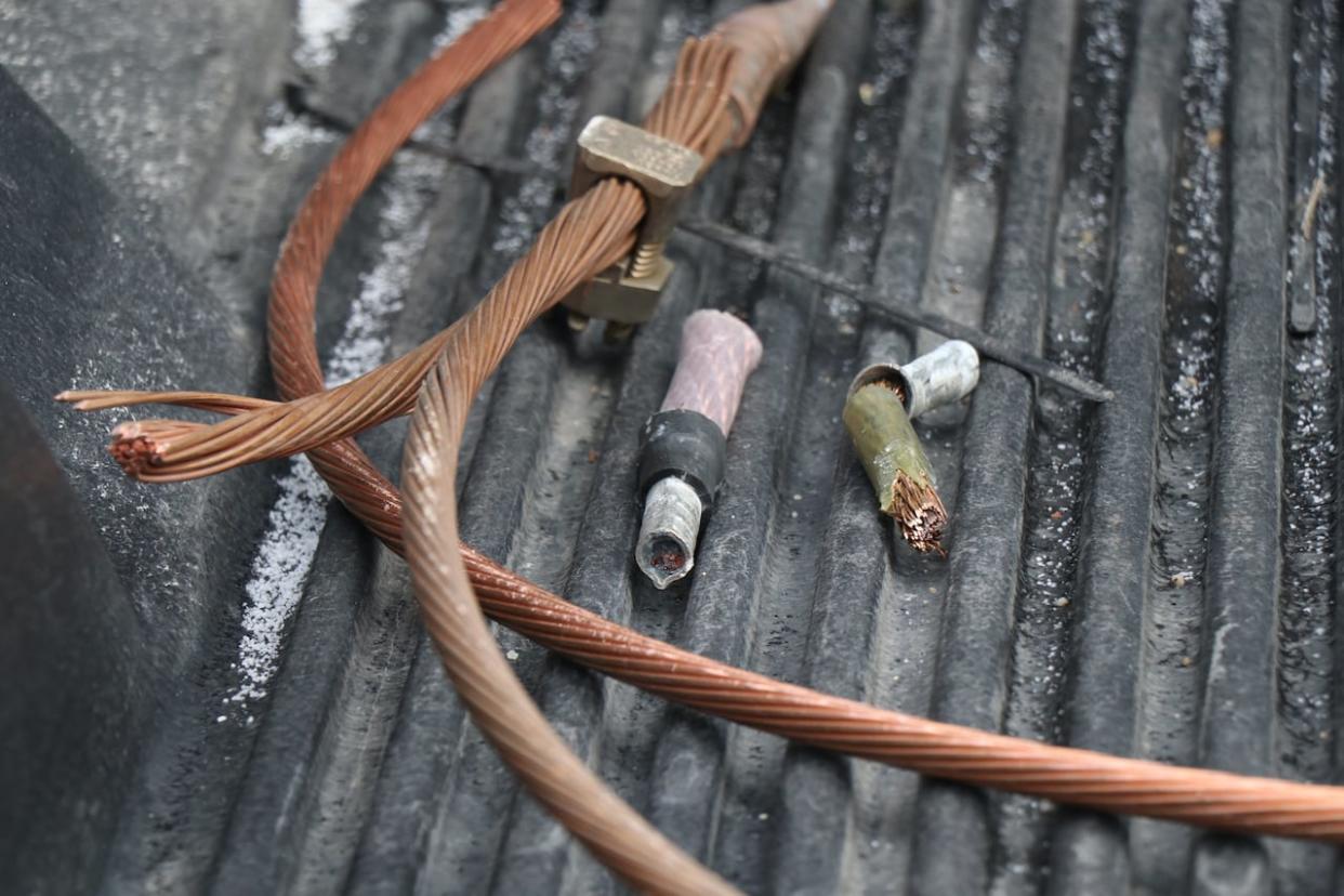 Thieves often take copper wire to sell to scrap metal dealers, according to Brian Lakey with Telus.  (Robert Short/CBC - image credit)