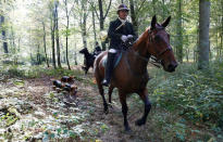 A participant on horseback attends a roe dear-hunt in the Chantilly royal estate forest, north of Paris, France, October 12, 2016. Picture taken October 12, 2016. REUTERS/Jacky Naegelen