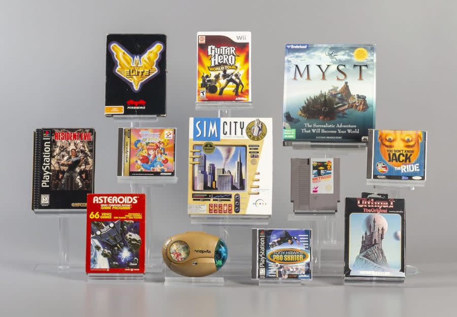 This image provided by The Strong shows 12 finalists being considered for induction into the World Video Game Hall of Fame in Rochester, N.Y. Asteroids, Elite, Guitar Hero, Metroid, Myst, Neopets, Resident Evil, SimCity, Tokimeki Memorial, Tony Hawk's Pro Skater, Ultima, and You Don't Know Jack. Three or four of the finalists will be inducted in May following voting by a panel of judges and the public. (Evyn Morgan/The Strong via AP)