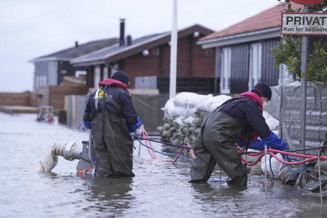 Gale-force winds and floods strike northern Europe. At least 3 people  killed in the UK