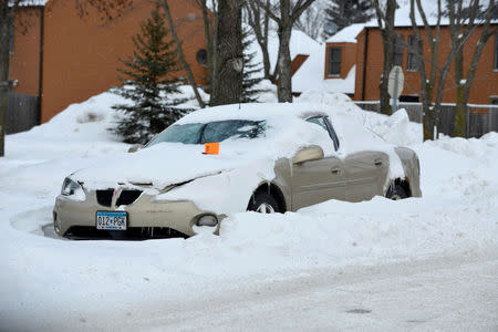 A car is tagged for towing during subzero temperatures carried by the polar votex in Fargo, North Dakota, U.S., January 31, 2019. REUTERS/Dan Koeck