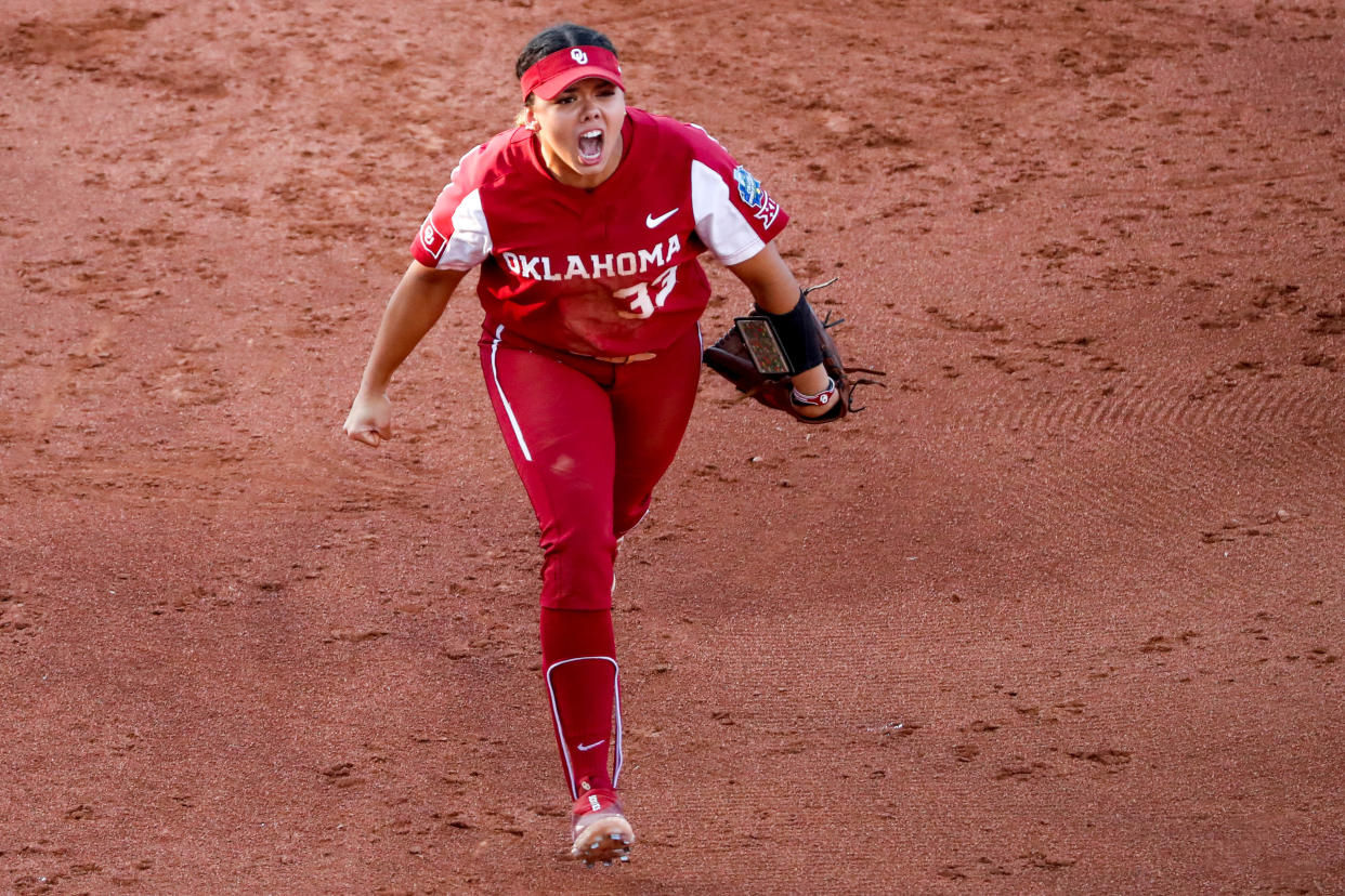 Alyssa Brito celebrates after tagging out Florida State outfielder Kaley Mudge at third base to end the third inning.