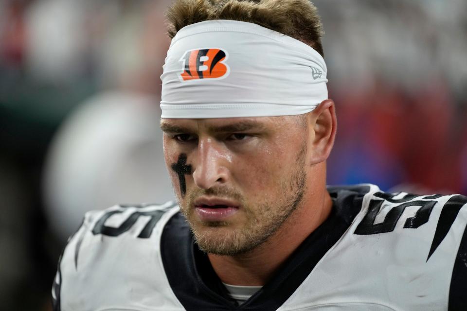 Cincinnati Bengals linebacker Logan Wilson (55) walks for the locker room after the second quarter of the NFL Week 4 game between the Cincinnati Bengals and the Miami Dolphins at PayCor Stadium in downtown on Thursday, Sept. 29, 2022. The Bengals 14-12 at halftime. 