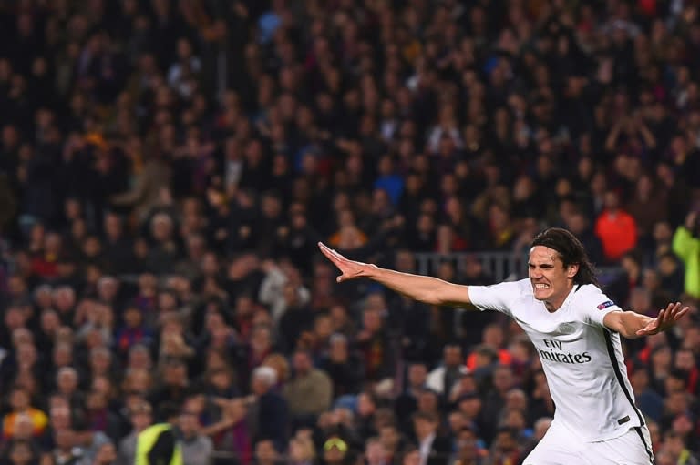 Paris Saint-Germain's forward Edinson Cavani celebrates after scoring their first goal during the UEFA Champions League round of 16 second leg football match FC Barcelona vs Paris Saint-Germain FC at the Camp Nou stadium in Barcelona on March 8, 2017