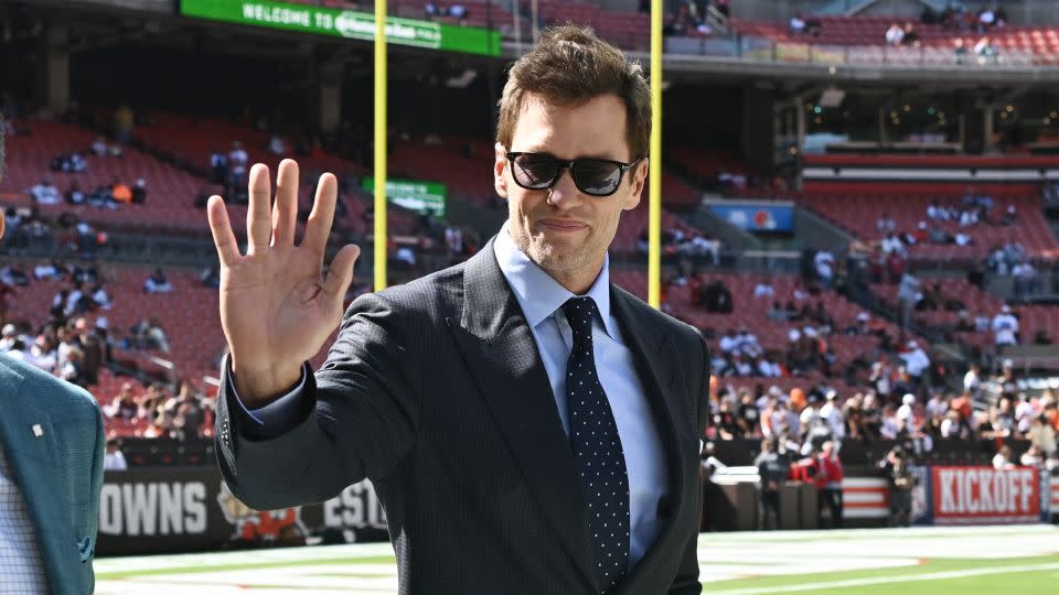 Brady greets fans ahead of the game between the Cleveland Browns and the Dallas Cowboys. - Ken Blaze/USA Today/Reuters