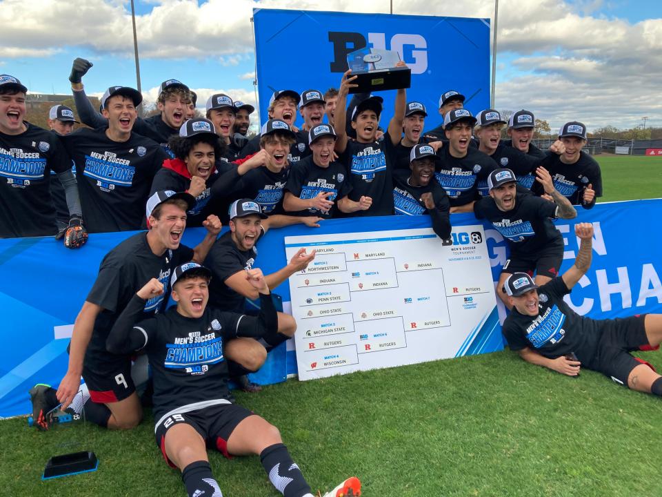 The Rutgers men's soccer team celebrates after winning the Big Ten Tournament title