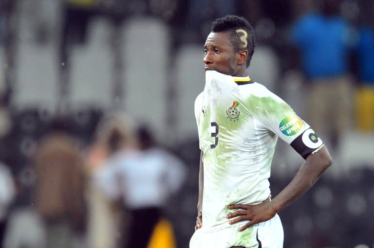 Ghana forward Asamoah Gyan cuts a dejected figure after his side went out on penalties in the semi-final of the Africa Cup of Nations, against Burkina Faso, on February 6, 2013. Ghana face Mali on Saturday for third place