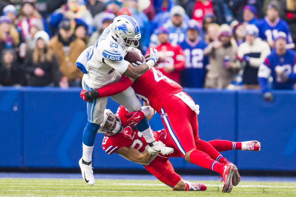 <p>ORCTheo Riddick #25 of the Detroit Lions is brought down by Micah Hyde #23 and Tremaine Edmunds #49 of the Buffalo Bills during the fourth quarter at New Era Field on December 16, 2018 in Orchard Park, New York. Buffalo defeats Detroit 14-13. (Photo by Brett Carlsen/Getty Images) </p>