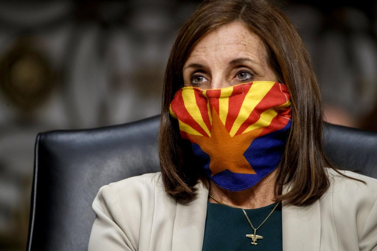 Image: Sen. Martha McSally, R-AZ, listens to testimony at a hearing at the Capitol on May 6, 2020. (Shawn Thew / Getty Images file)