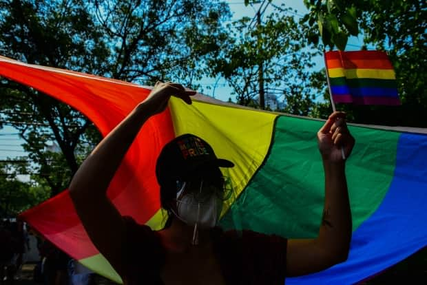 Even though the LGBTQ population in Canada is almost equal to the entire population of Saskatchewan, queer voters in the province say their issues and rights aren’t being reflected proportionately in the federal election. (Maria Tan/AFP/Getty Images - image credit)