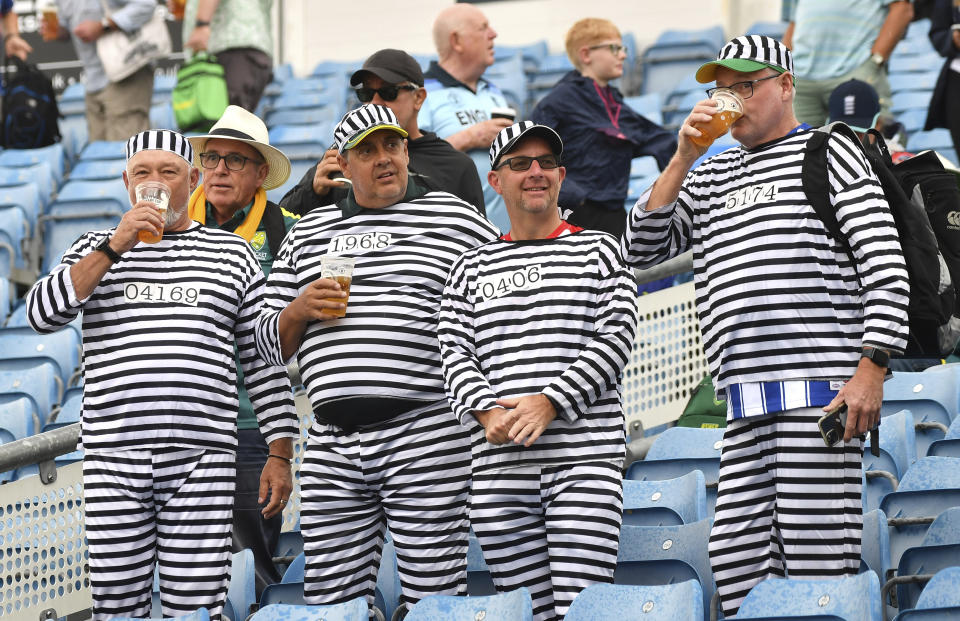 Spectators look on before rain delays play during the third day of the third Ashes Test match between England and Australia at Headingley, Leeds, England, Saturday, July 8, 2023. (AP Photo/Rui Vieira)