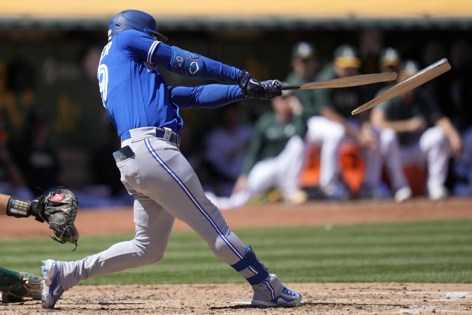 Toronto Blue Jays' Kevin Kiermaier breaks his bat hitting into a double play that scored Alejandro Kirk against the Oakland Athletics during the fifth inning of a baseball game in Oakland, Calif., Monday, Sept. 4, 2023. (AP Photo/Jeff Chiu)