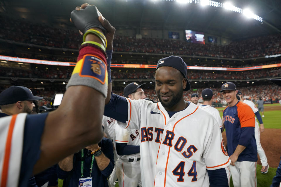 Houston Astros designated hitter Yordan Alvarez celebrates after their win against the Boston Red Sox in Game 6 of baseball's American League Championship Series Friday, Oct. 22, 2021, in Houston. The Astros won 5-0, to win the ALCS series in game six. (AP Photo/David J. Phillip)