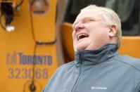 Toronto Mayor Rob Ford attends a news conference at a city public works yard to discuss the city's winter snow plowing agenda December 6, 2013. REUTERS/Fred Thornhill (CANADA - Tags: POLITICS)