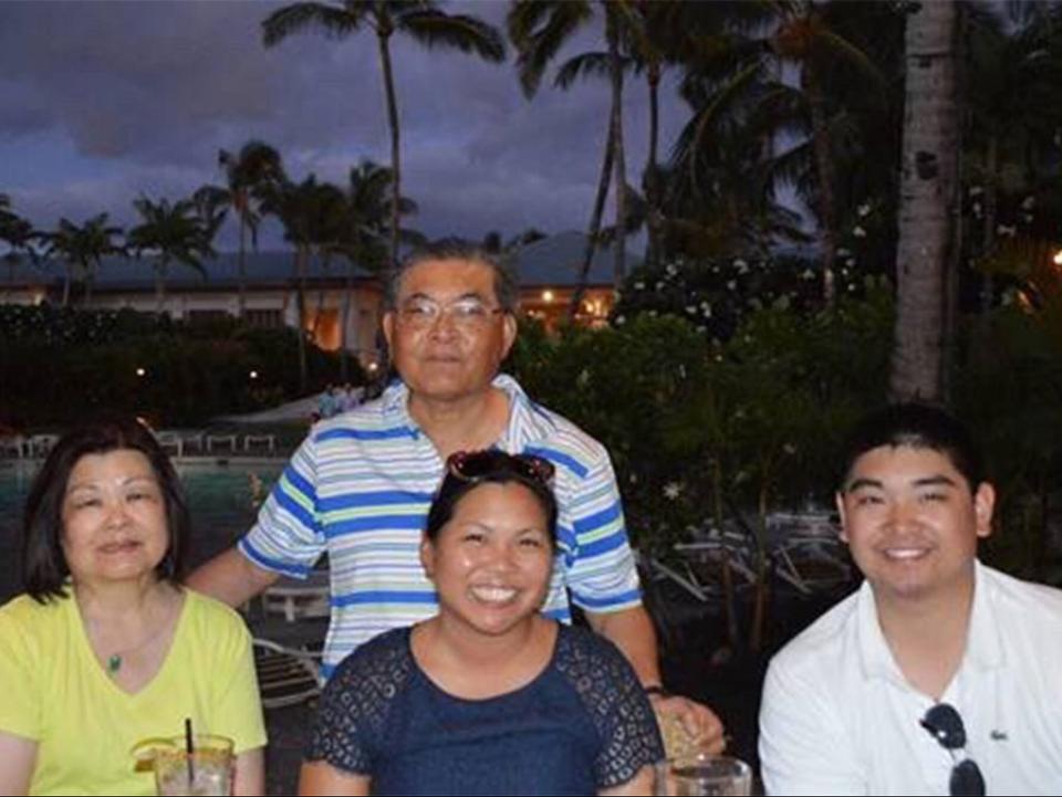 Michelle Go is pictured with her family before her death on Saturday (CeFaan Kim / Twitter)