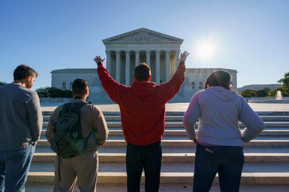 Anti-abortion activists with "Bound 4 Life" demonstrate at the Supreme Court in Washington, Monday, Oct. 5, 2020, as the justices begin a new term without the late Justice Ruth Bader Ginsburg. 